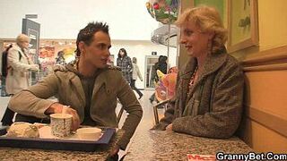 Blonde granny jumps on his cock - porn video