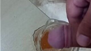 Pissing in a jar - porn video