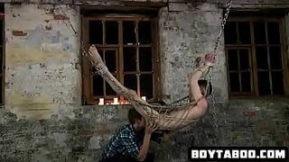 Horny chained up hunk gets his hard cock sucked - porn video