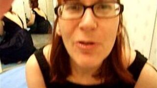 Amateur gives a blowjob in a stores dress in the dressing room - porn video